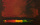Abstract painting with shades of red, yellow, green and orange