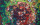 Abstract art piece with speckles of color throughout